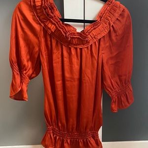 Orange over the shoulder blouse